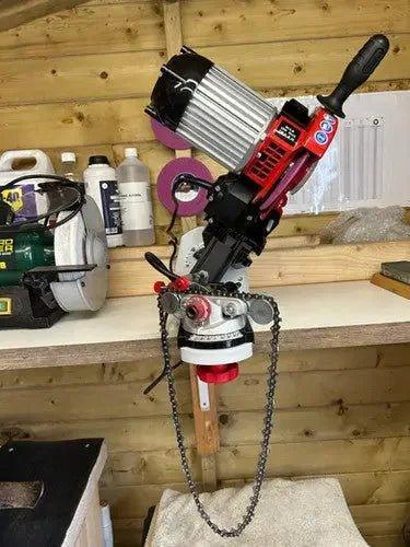 Professional scissor and knife sharpening machine in workshop setting, Somerset