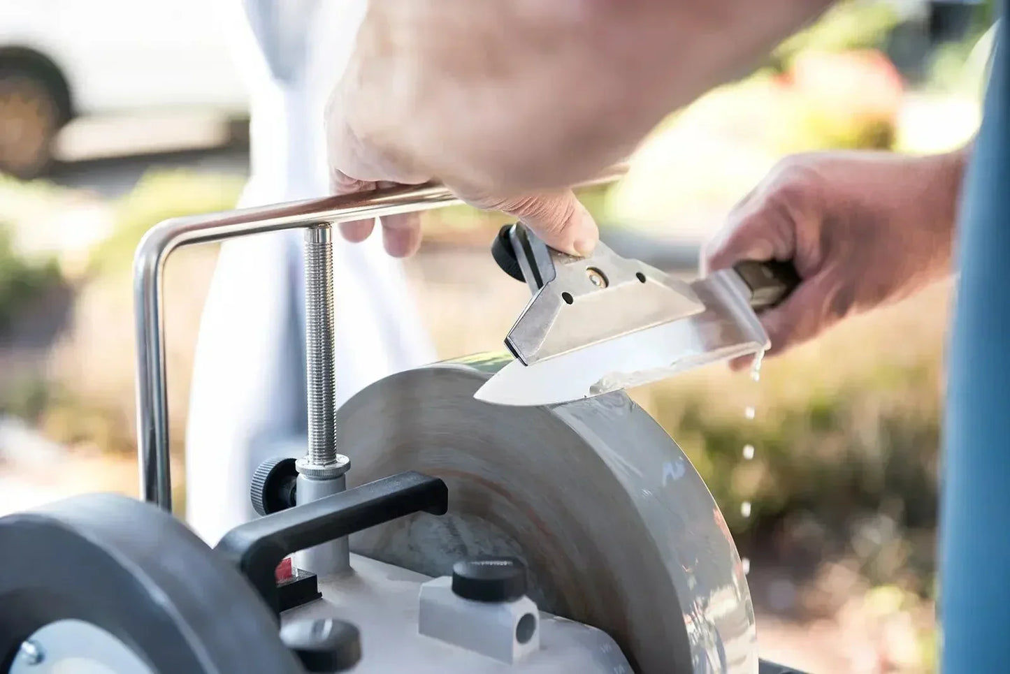 Professional knife sharpening with water-cooled grinding wheel, Somerset sharpening service