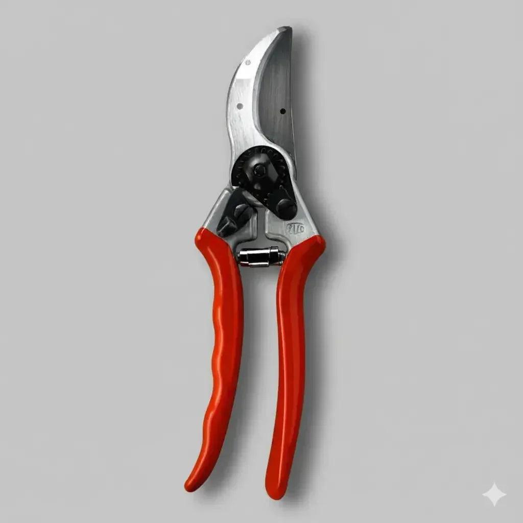 Red-handled pruning shears with sharp steel blades for garden tool sharpening service in Somerset