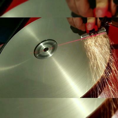 Metal surface being ground with sparks flying, close-up view.