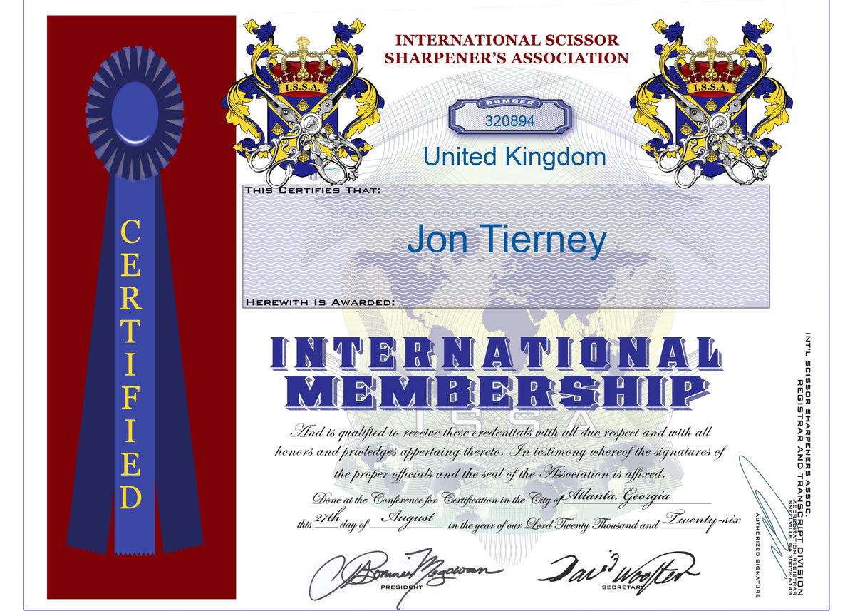 A novelty or replica International Scissor Sharper's Association certificate for Jon Tierney, featuring a red ribbon award on the left, ornate blue and gold emblems at the top, and blue text on a white and light blue patterned background.